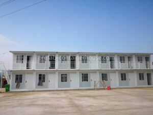 A stackable 2-story folding container house project with a balcony for space-saving living