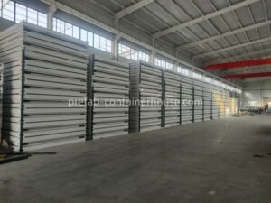 Sunfine factory warehouse filled with massive stacks of foldable container homes for bulk orders