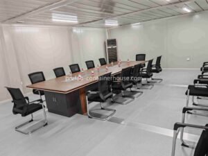 Professional conference room inside a flatpack container, featuring high-quality insulation for american flat pack houses standards